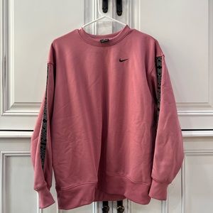 pink Nike hoodie with detailed arms